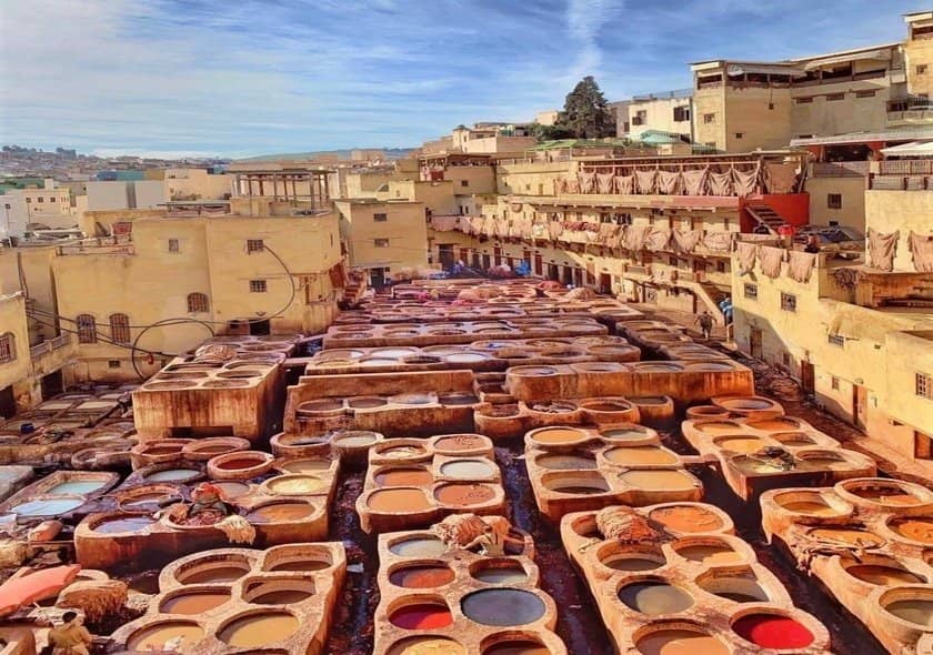 Traditional leather dye pits at Chouara Tannery in Fez, Morocco