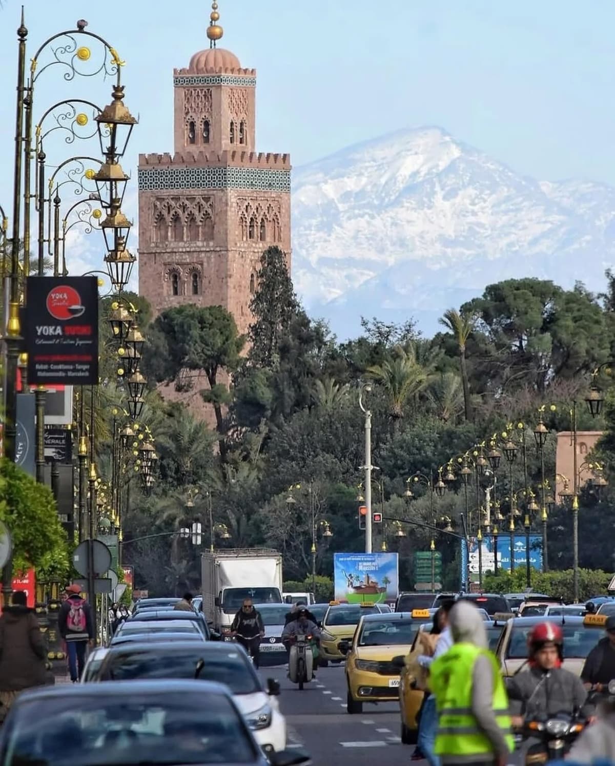 Koutoubia Mosque with the Atlas Mountains in Marrakech