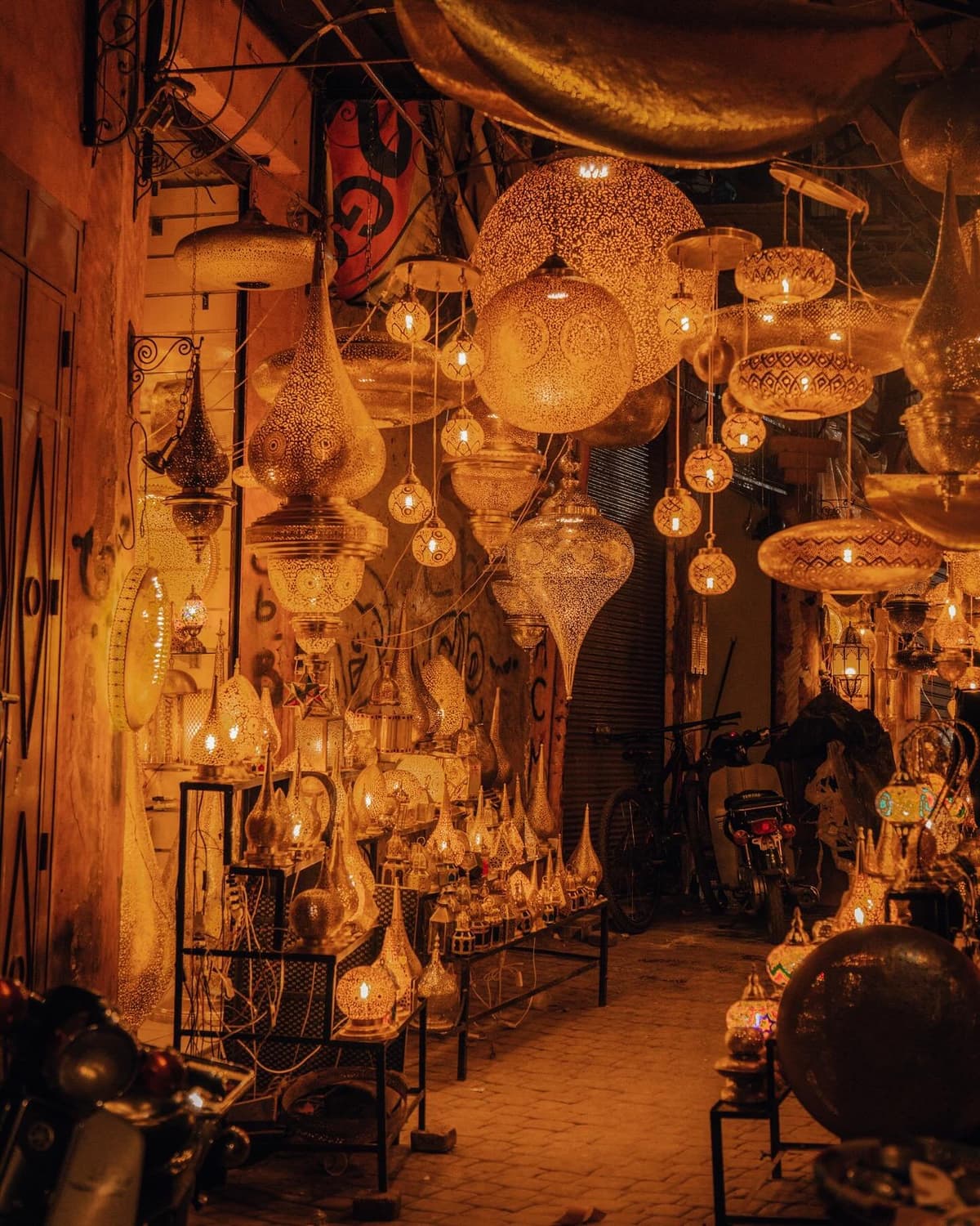 Is Morocco expensive to visit – traditional Moroccan lanterns in a Marrakech souk
